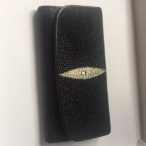 Stingray skin black clutch trifold wallet.